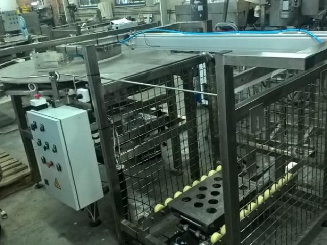 Комплекс загрузки и выгрузки тары из прямоугольных автоклавных корзин (с подвижным дном) в Медногорске